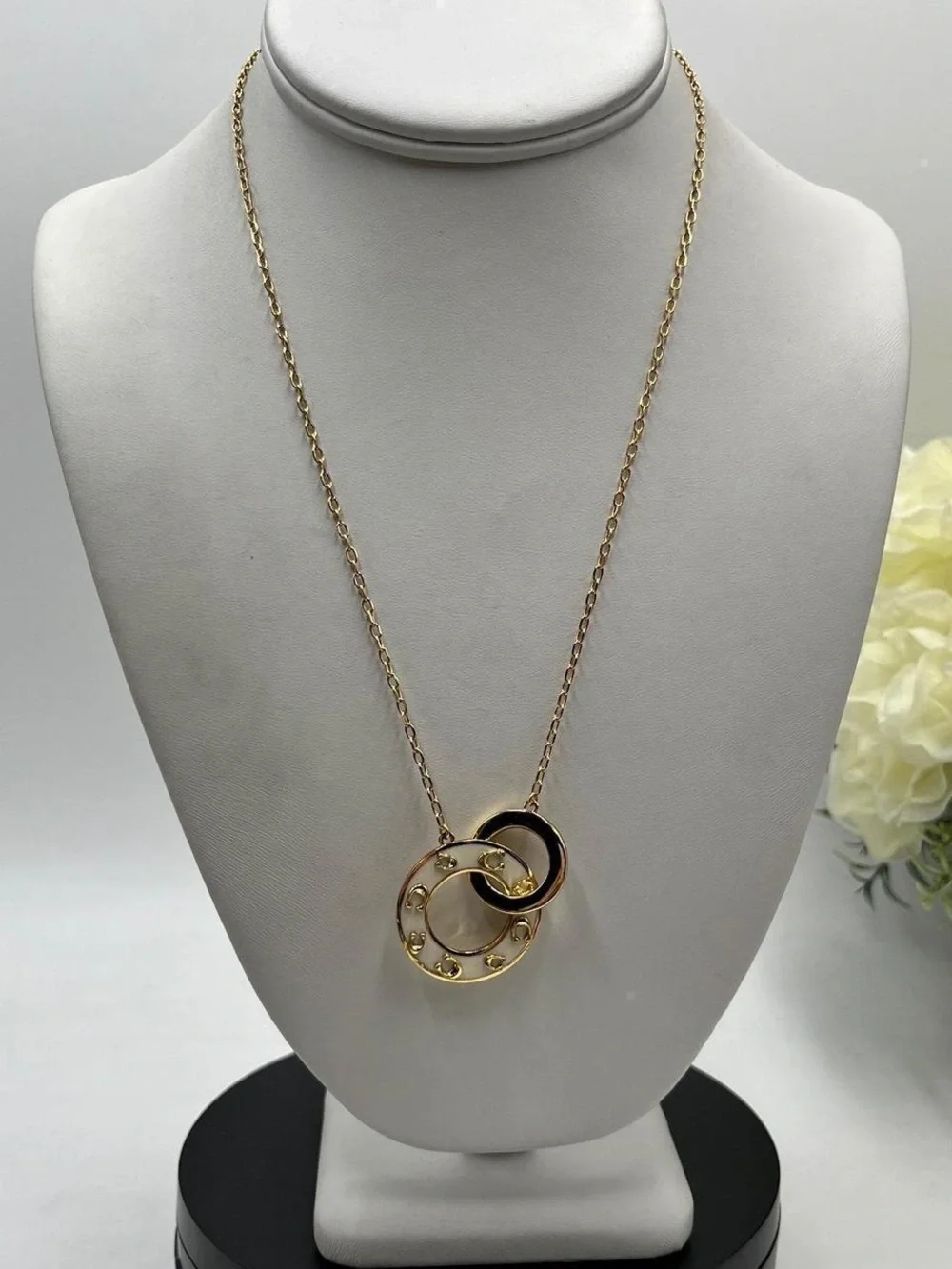 Coach Gold-Tone Interlocking Circle Necklace with Black and Cream Enamel